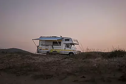 A sleek electric vehicle (EV) connected to an ultra-fast StromBay charging station, illustrating the premium and efficient charging experience