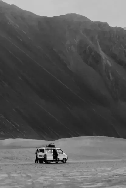 A sleek electric vehicle (EV) connected to an ultra-fast StromBay charging station, illustrating the premium and efficient charging experience